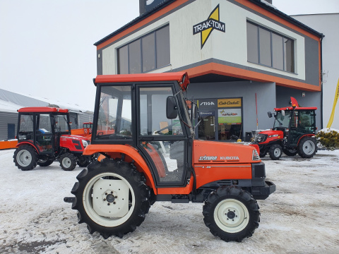 Traktor Kubota x20 z ogrzewaną kabiną